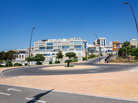 View in Alicante with Palm Trees and Mediterranean Architecture in Spain