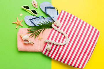 Composition with stylish beach accessories on colored background, top view. Beach fashion flat lay,...
