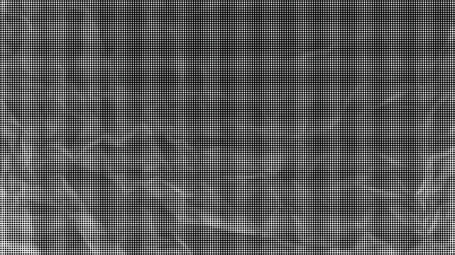 A close-up view of crumpled paper texture in a dark environment