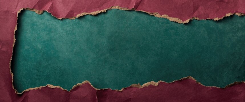 Torn maroon paper revealing green background texture