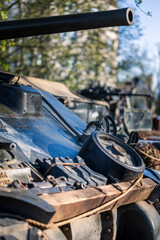 Fototapeta premium Close up of a historic military tank barrel and armor with equipment during a World War II historical reenactment event.