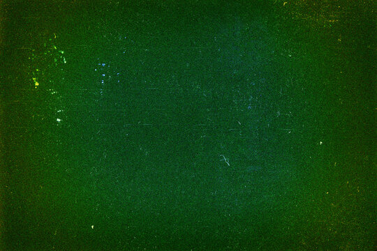 Blank grained film strip texture background with heavy grain, dust and light leak
