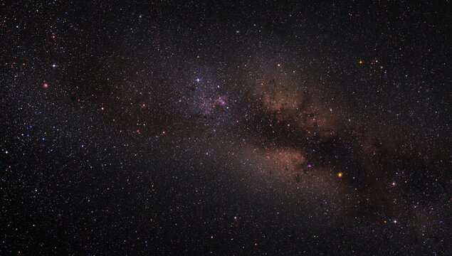 Colorful stars and glowing nebulae shaping a lively galaxy on a dark cosmic field