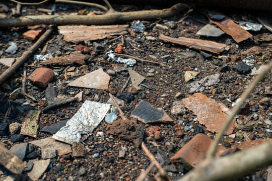 Ground Covered With Dirt Rocks And Scattered Debris