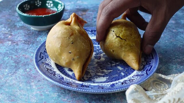 two singara on a plate. a indian traditional food
