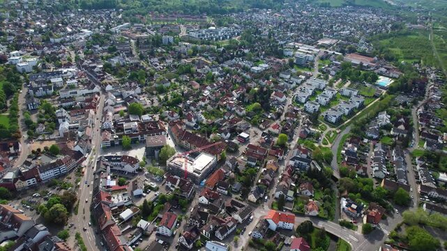 Aerial view around the old town of the city Achern, in south Germany on a sunny spring noon.
