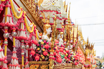 Naklejka premium The Yasothon Rocket Festival, a traditional Isaan festival, is deeply rooted in the way of life of the people. Rockets are paraded and launched to worship Phaya Thaen, the rain god, in order to bring 