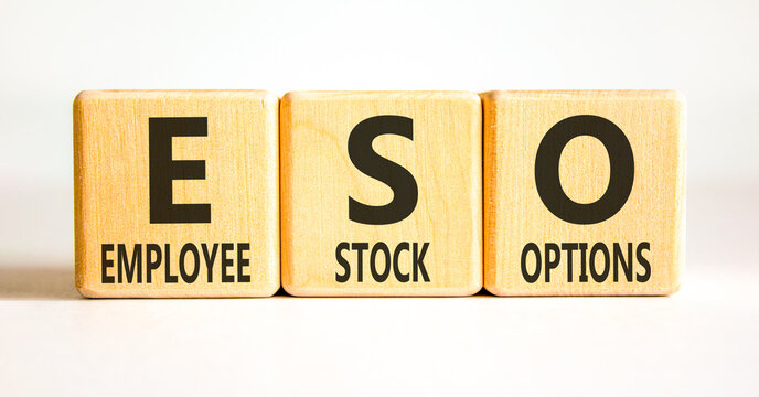 ESO employee stock options symbol. Concept words ESO employee stock options on beautiful wooden blocks. Beautiful white background. Business ESO employee stock options concept. Copy space.