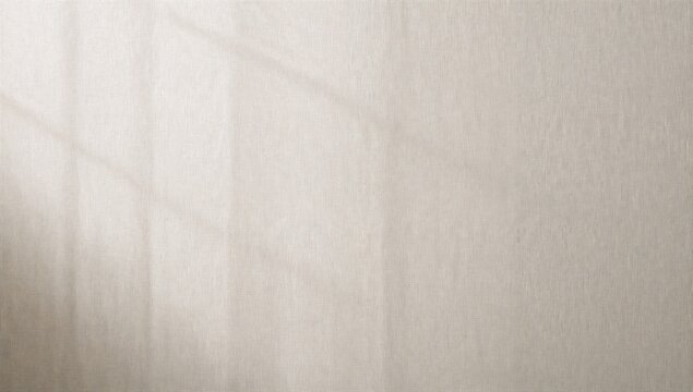 Neutral light-colored fabric with visible texture and subtle shadows in natural lighting