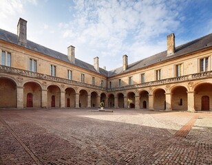 Fototapeta premium empty courtyard of the castle of the dukes of la tremoille