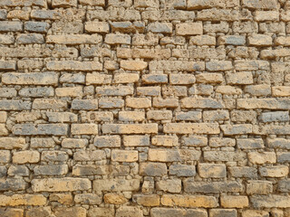 Fototapeta premium Ancient walls made of bricks glued together with clay
