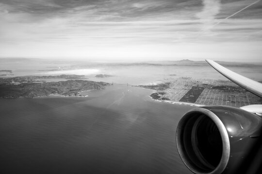 view from the plane of the Golden Gate bridge and San Francisco Bay Area in California