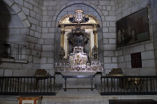 baroque altarpiece in a chapel in a gothic cathedral in avila in spain 