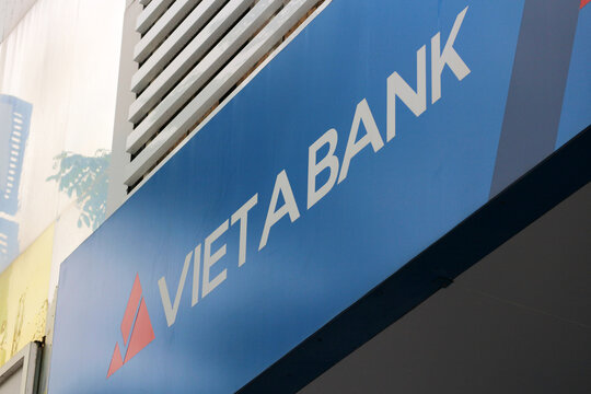DANANG, VIETNAM - JANUARY 22, 2026: A close-up perspective angle view of the VietA Bank corporate logo and 3D sign letters on a building facade.