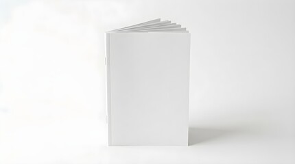 Obraz premium Blank white brochure or booklet mockup standing upright, isolated on white background