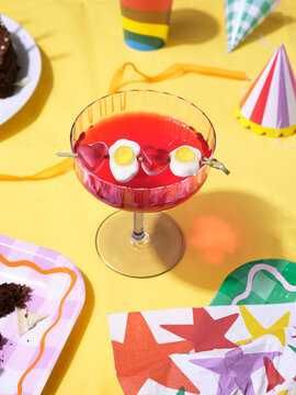 Jelly in cocktail glass with Harrow on a cocktail stick