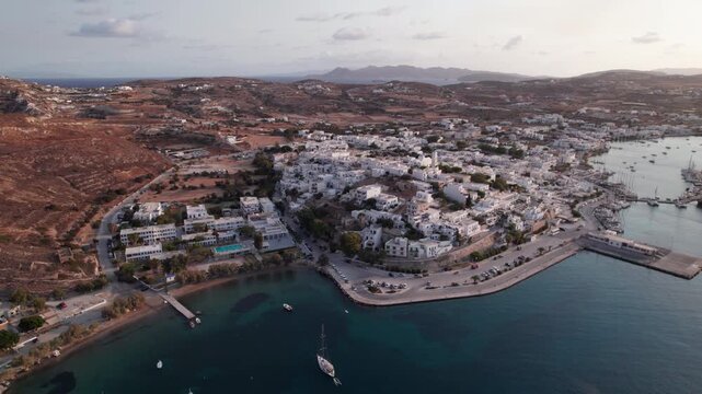 Drone view of secluded bay with sailboats near Parikia on Paros Island in Greece