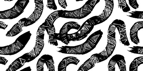 Abstract black and white pattern with brushstroke lines and tribal geometric elements. © GREENPIXEL Art