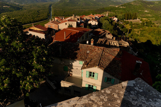 Hilltop village with red rooftops