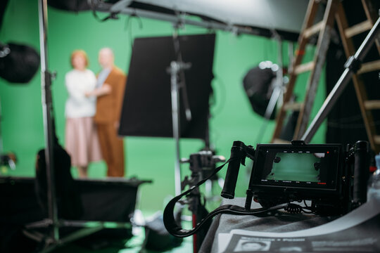 Film set, monitors and modern shooting equipment. Film crew, lighting devices, monitors, playbacks - filming equipment and a team of specialists in filming movies, advertising and TV series