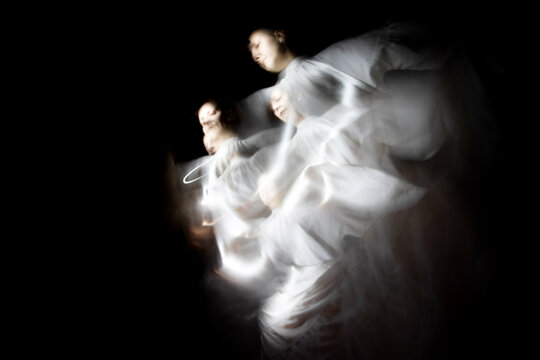 Dance in white in the dark 