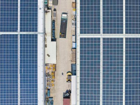 Aerial View of Factory Roof with Solar Panels