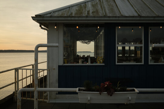 Sunset view from a waterfront building with a simple design