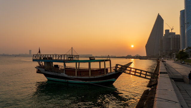 Doha, Qatar June 13, 2026: Visitors enjoy scenic sea views along vibrant Corniche waterfront, a premier destination attracting tourists year-round.