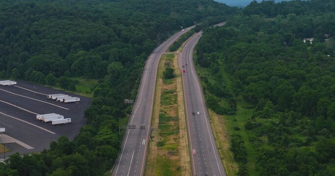 Fishkill NY - June 10, 2026:  Hyperlapse, time lapse, aerial video of Interstate 84 heading east in Dutchess County, New York on an overcast spring afternoon spring.
