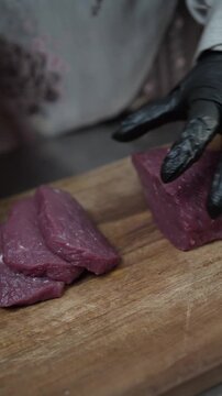 cutting the beef at the round