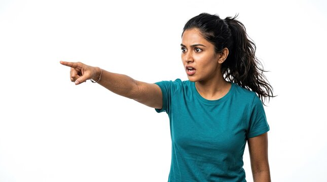 An Indian woman pointing aggressively with a shocked and accusatory facial expression against a white background
