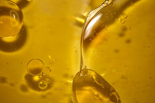 Close-up of Transparent Liquid with Bubbles and Viscous Texture