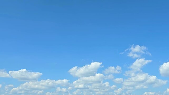Cloudscape, Timelapse of Blue Sky with Fluffy White Cumulus Clouds along Horizon for Background and Banner Design