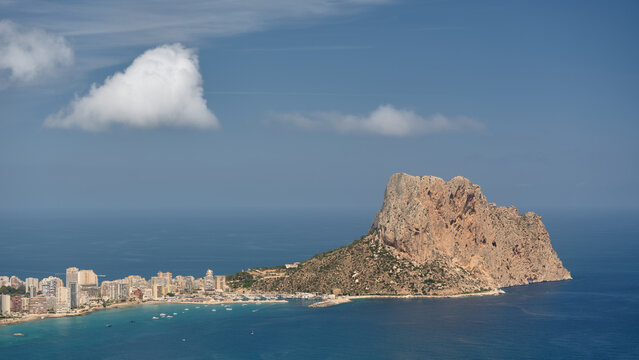 Scenic view of Penon de Ifach and Calpe coastline from Mirador Morro de Toix, a Mediterranean travel destination on Spain's Costa Blanca