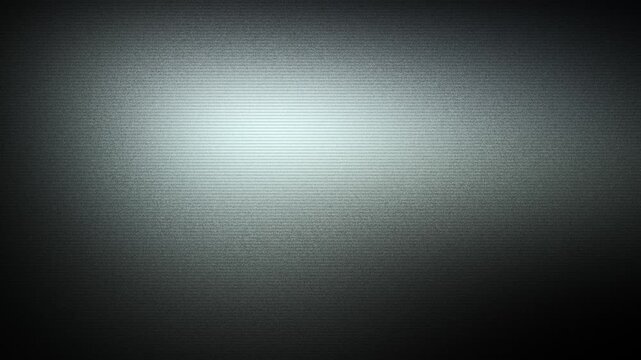 Soft cyan light bleeding through heavy dark textured grain