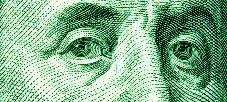 portrait of Benjamin Franklin on the US 100 dollar bill. Detailed texture of American national currency banknote. Money USA
