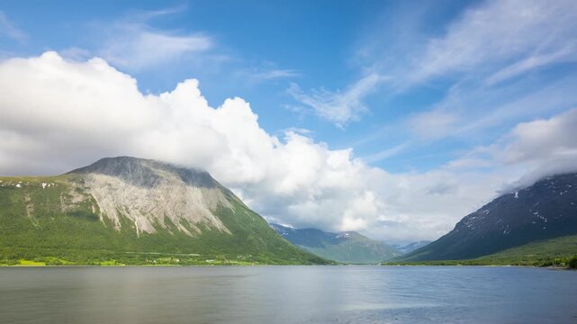 Time lapse of the clouds moving above the  amazing coastline and mountains of Norway.