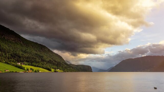 Time lapse of the clouds moving above the  amazing coastline and mountains of Norway.