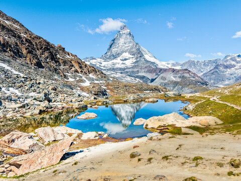 Zermatt, 15.06.2026, Switzerland. A popular stop along the trail to Gornergrat, Riffelsee Lake, and the reflection of the beautiful Matterhorn 