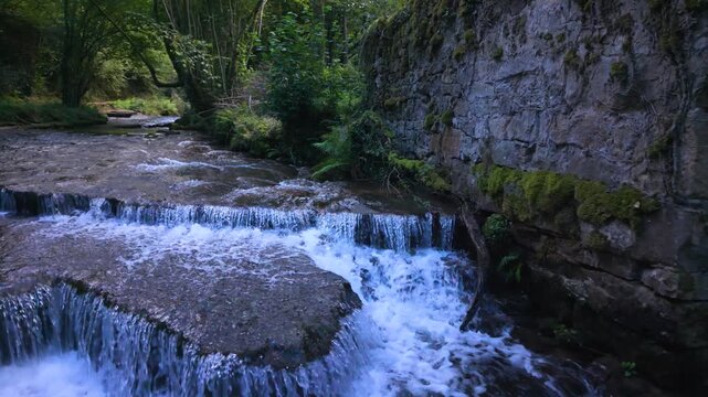 Landscape along a river near San Pedro del Romeral. Pas-Miera region. Pasiegos Valleys. Cantabria. Spain. Europe