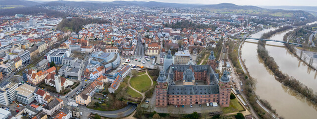 Fototapeta premium Aerial view beside the old town above the city Aschaffenburg in Germany, on a sunny afternoon in autumn.