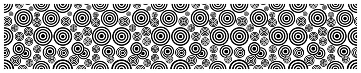 Fototapeta premium Concentric circles and circular rings in various sizes form an abstract seamless pattern in a hypnotic geometric style