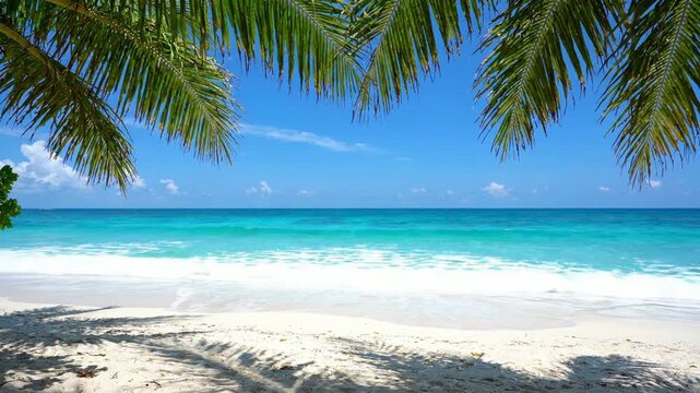 Tropical beach paradise with palm leaves and turquoise ocean waves, sunny summer vacation background