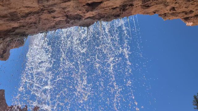 Mossy Cave Waterfall and blue sky in Bryce Canyon National Park, Utah, USA