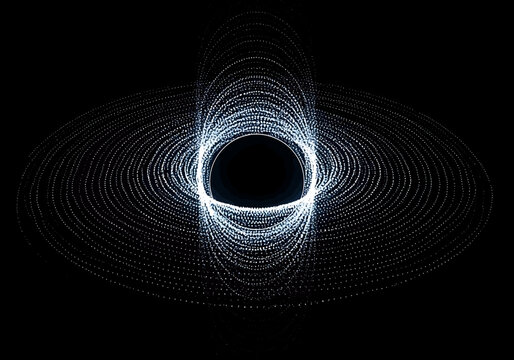 Abstract digital representation of a black hole with glowing particle rings