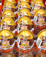 Naklejka premium Kinder joy harry potter funko surprise eggs displaying in retail store