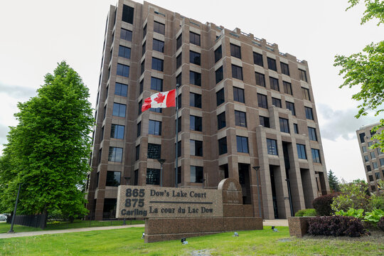Ottawa, Canada - May 28, 2026: Dow's Lake Court Conference Centre. Canadian Medical Protective Association building with national flag