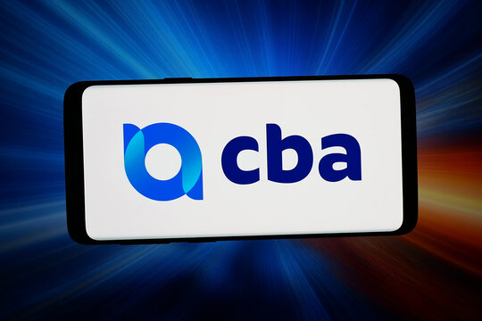 Stuttgart, Germany - 06-15-2026: In this photo illustration, the logo of company Companhia Brasileira de Aluminio CBA is displayed on a smartphone in front of abstract background on computer screen.