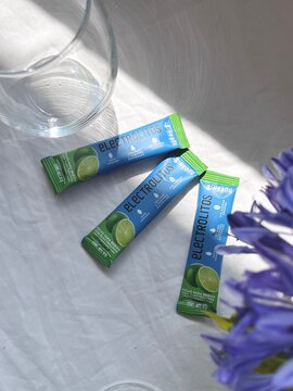 Glass and water and electrolytes on the table