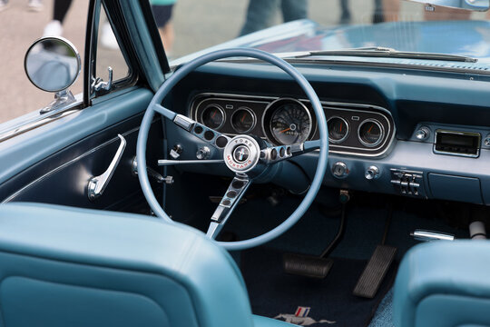Koprivnice, Czechia - 31 May, 2026: Ford Mustang 1967 - car, auto and automobile detail. Well preserved and maintained classic interior with original interior and steering wheel. Shallow focus